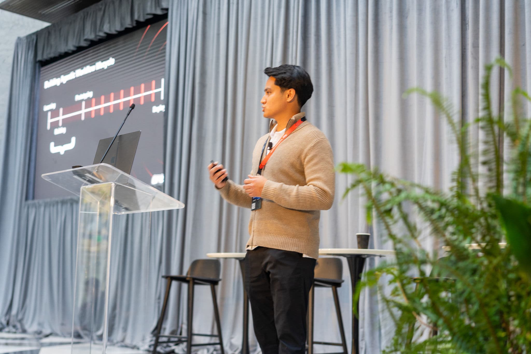 Lorenze Jay speaking on stage.